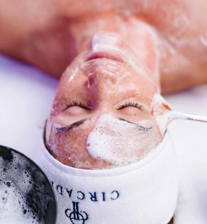 Cleansing foam being applied with a brush – double cleansing during the 50-minute facial in Vienna