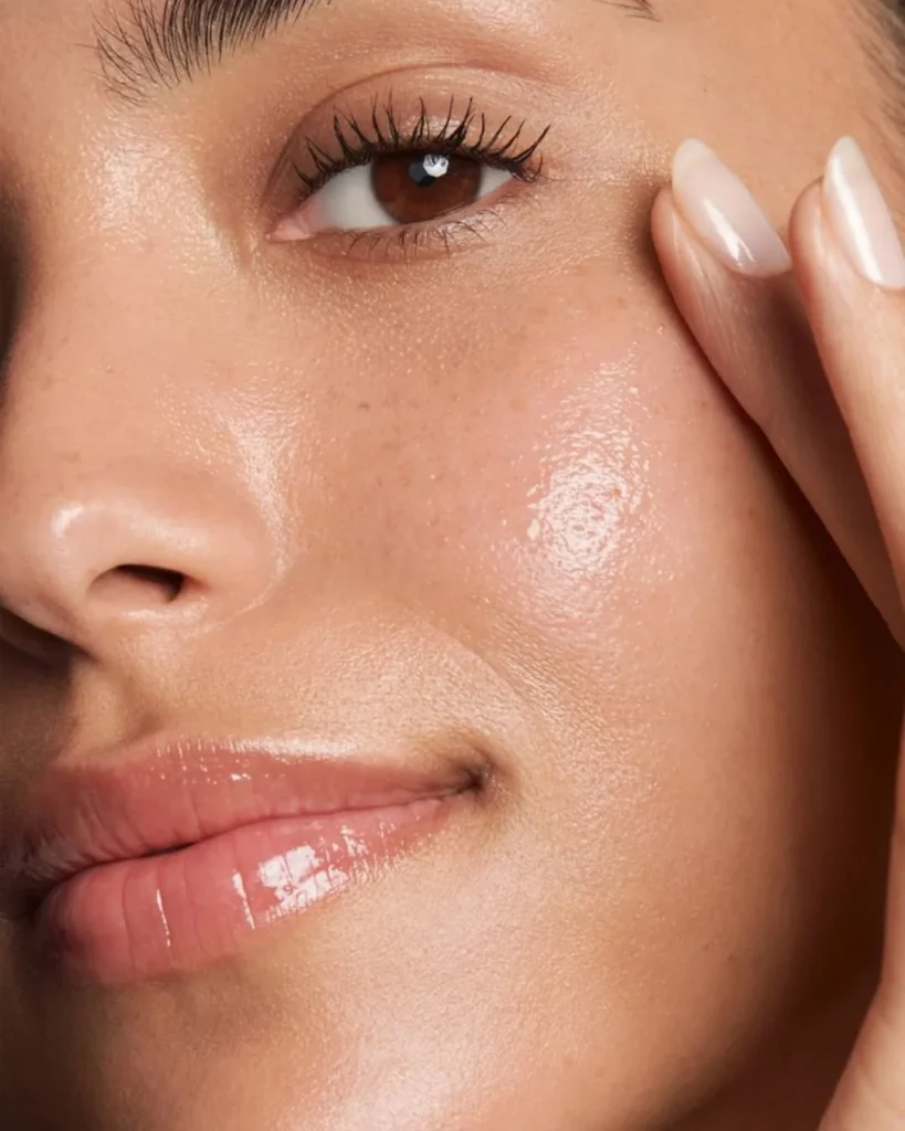 Client with radiant skin after a treatment at AFACIAL